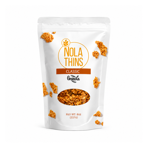 A 8 oz stand-up pouch of NolaThins Classic Granola on a clean white background. The packaging is white with granola clusters around the bag, featuring a clear window near the bottom that displays the golden-brown granola inside. Gluten-free vegan granola with rolled oats, sunflower seeds, and maple.